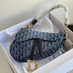 The iconic and legendary Saddle bag is made in blue,New With Box.